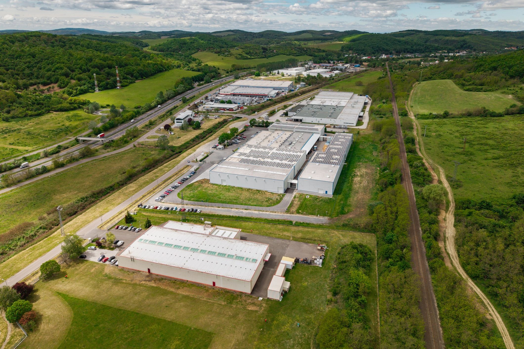 Aerial view of warehouse and industrial buildings in a business park