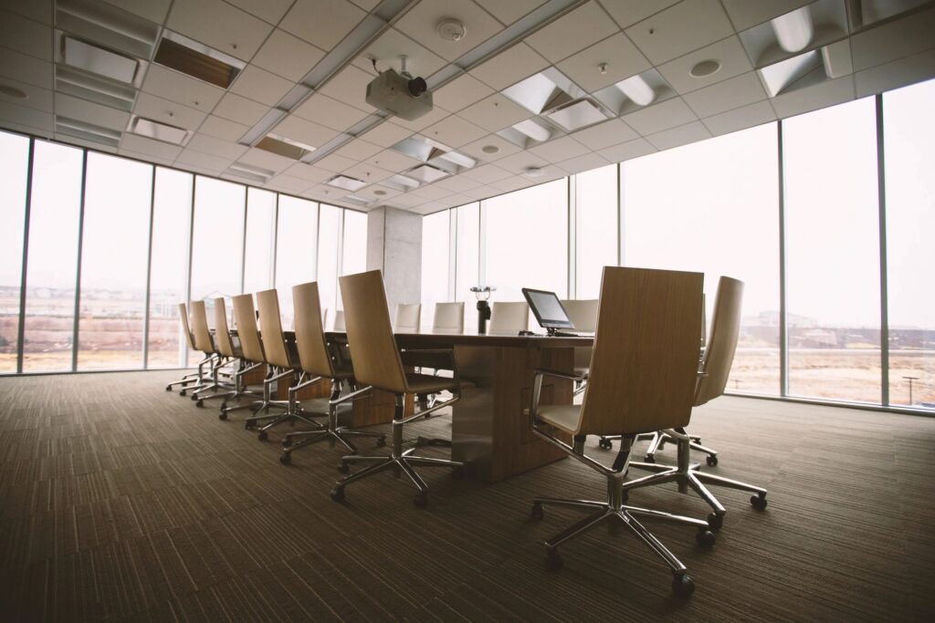 Bright conference room in a leased office, the kind of space tenant representation helps businesses secure
