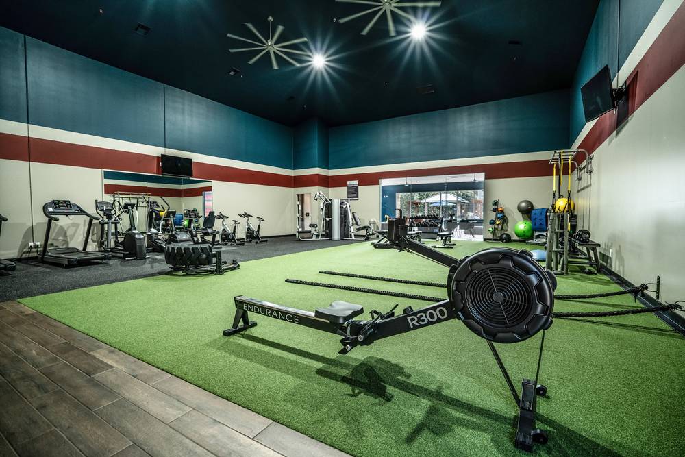 Multifamily fitness center with turf training area