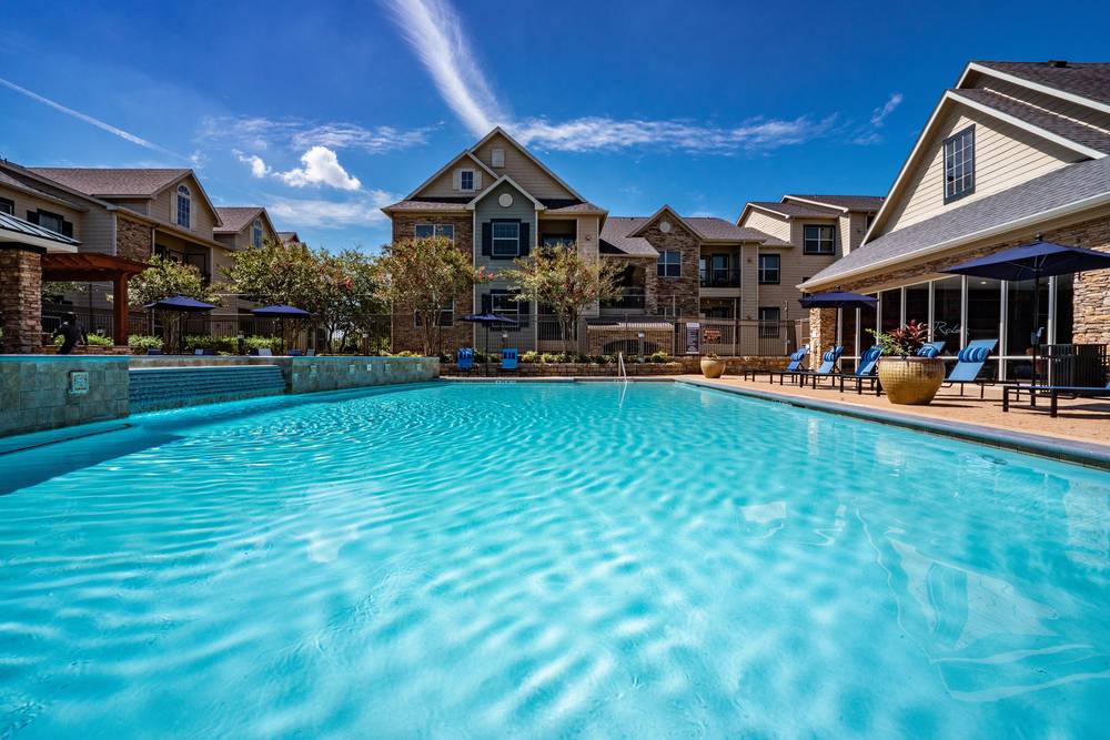 1031 exchange Colorado replacement property: multifamily community with pool and clubhouse