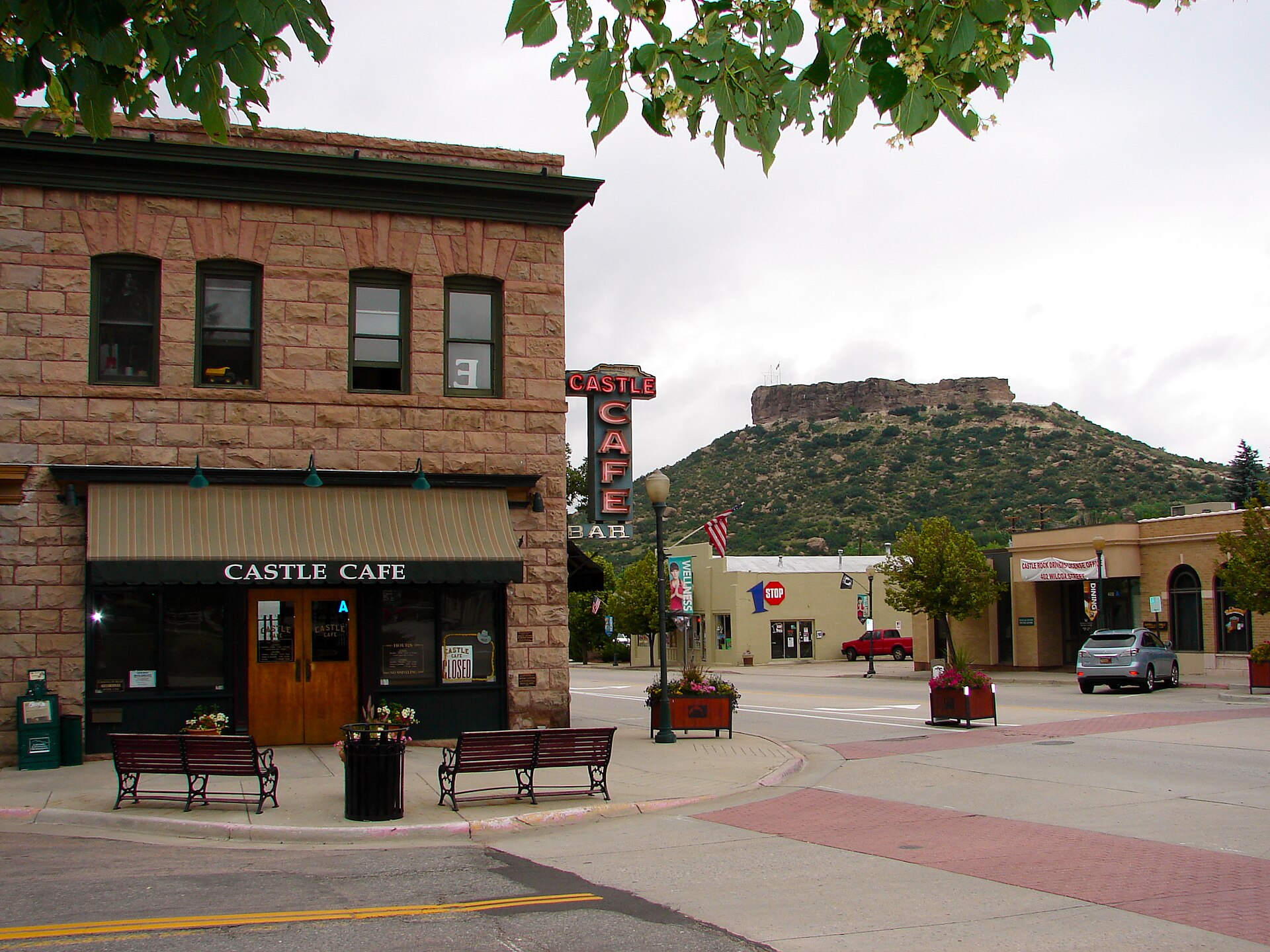 Downtown Castle Rock, Colorado storefronts with the Castle Rock butte behind